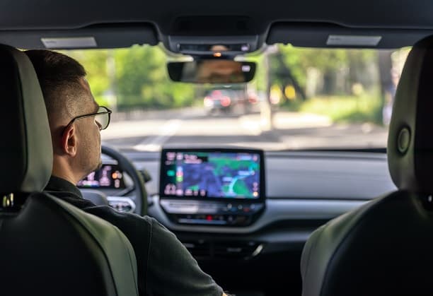 Low-Cost Solution for Abnormal Driving Behavior Detection using Multi-Source Data Fusion