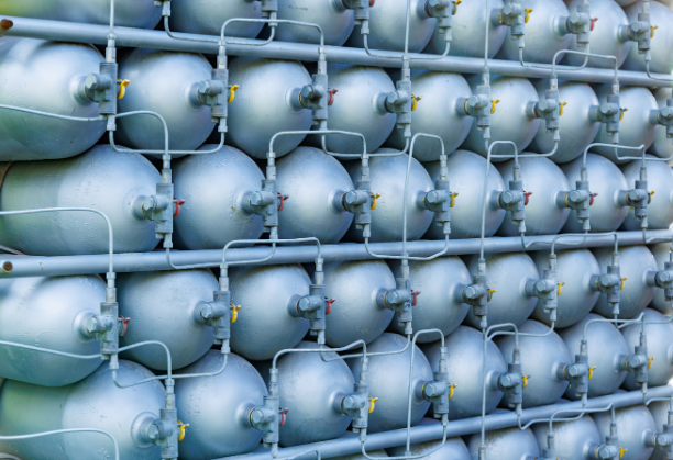 Development of a flex-fuel spark-ignition engine for utilization of green hydrogen-CNG blended fuels